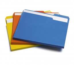 A neatly stacked array of four file folders in varying colors: blue, orange, red, and yellow. The folders are slightly fanned out, revealing their white tabs at the top—placeholders for labels that read 